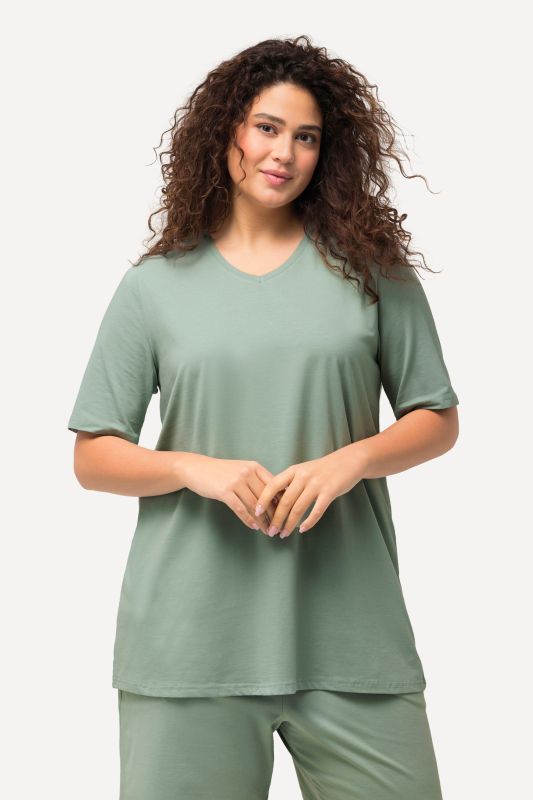 T-shirt à coupe évasée. Décolleté en V et manches courtes