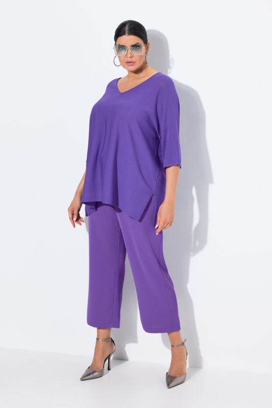 Pantalon 7/8 à pinces. Taille élastique