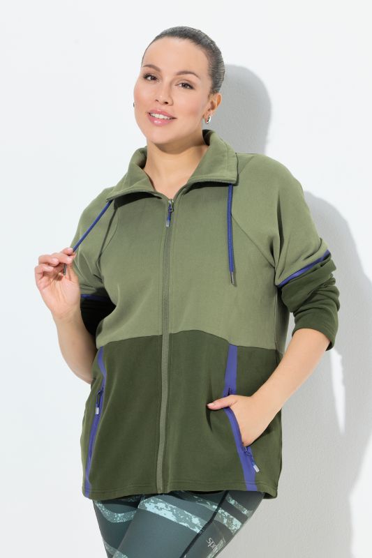 Veste en molleton bicolore à col montant, poches zippées