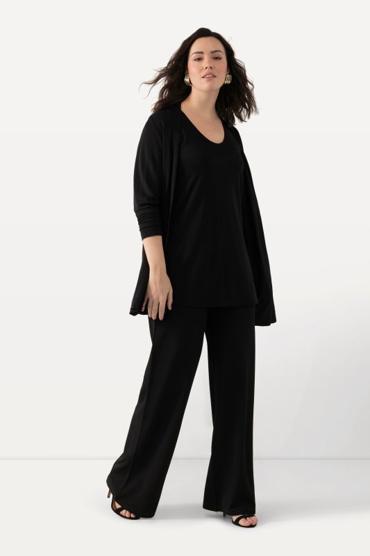Pantalon en piqué au tombé fluide, jambe large et taille élastique