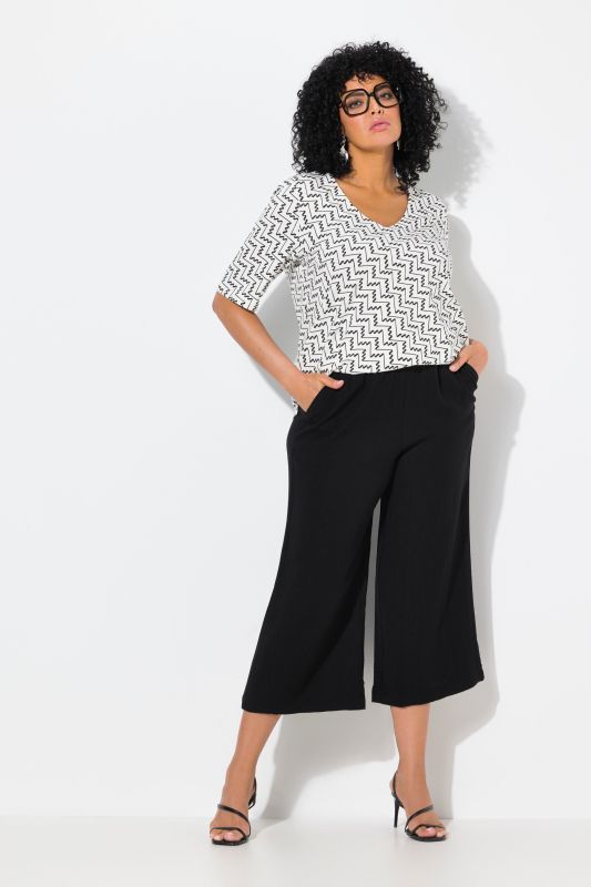 Jupe-culotte à taille élastique. Jambe large, longueur mollet