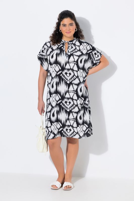 Robe oversize à col tunisien et manches courtes