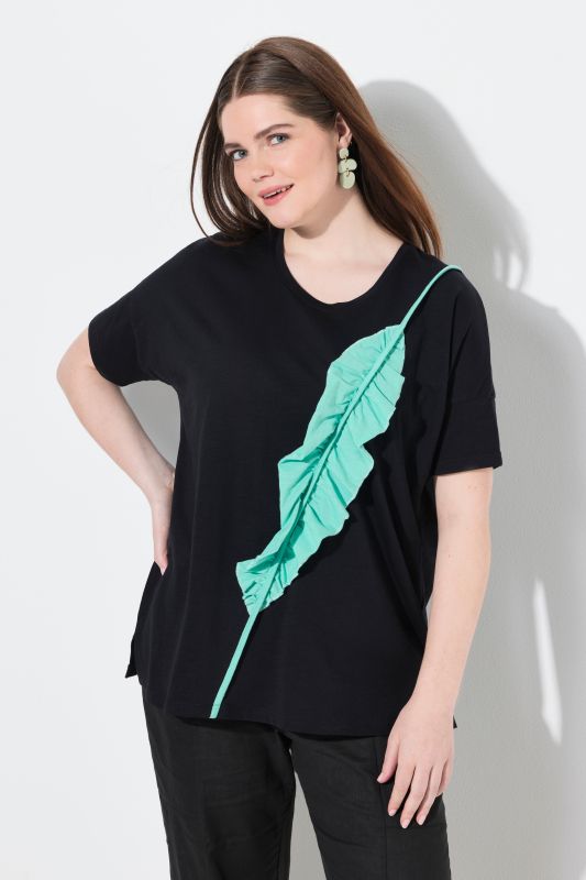 T-shirt oversize. Col rond et manches courtes. Coton bio