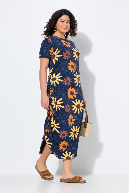 Robe maxi en jersey de coton bio. Encolure ronde et manches courtes. Motif floral