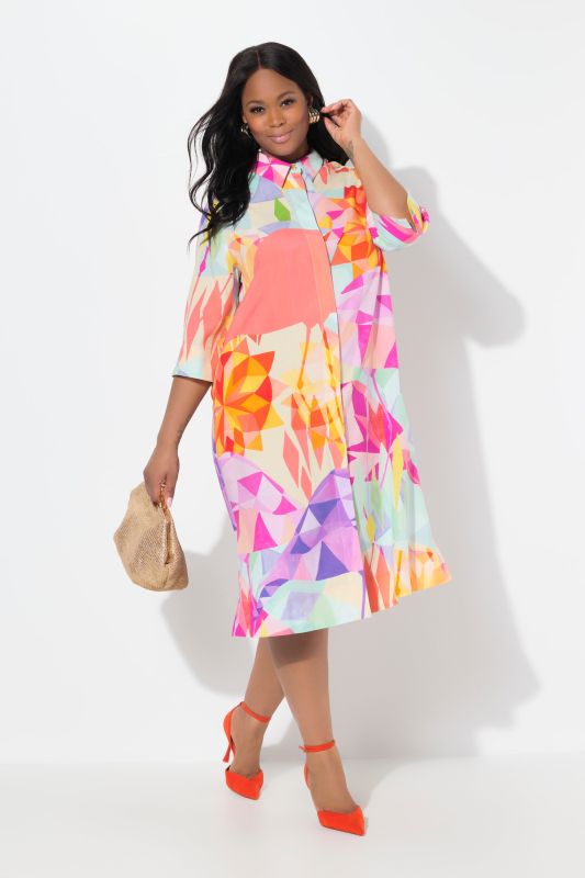 Robe midi en lyocell. Coupe évasée. Col chemise et manches 3/4