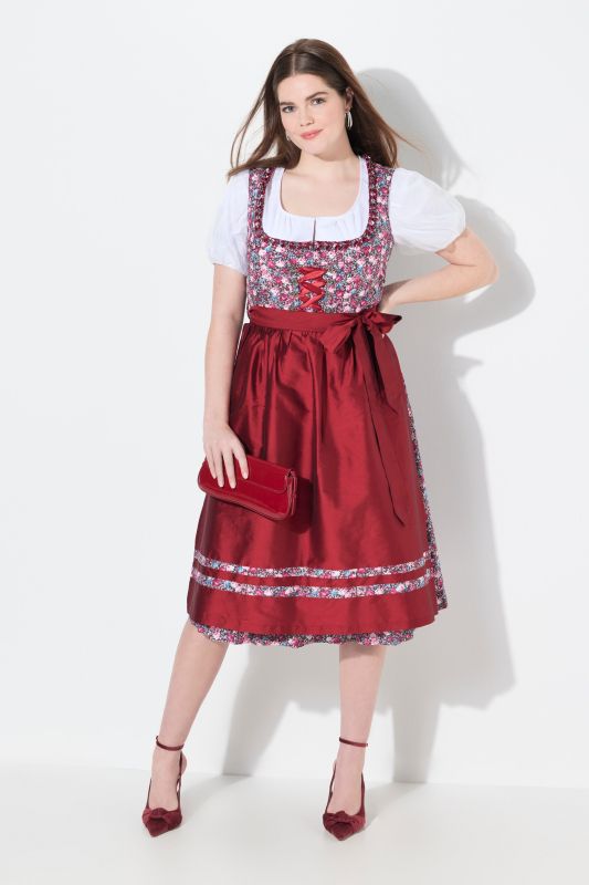 Dirndl lacé sans manches, costume traditionnel bavarois. Longueur midi et décolleté carré