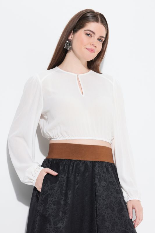 Chemisier traditionnel Dirndl. Manches longues et amples. Encolure ronde et taille élastique