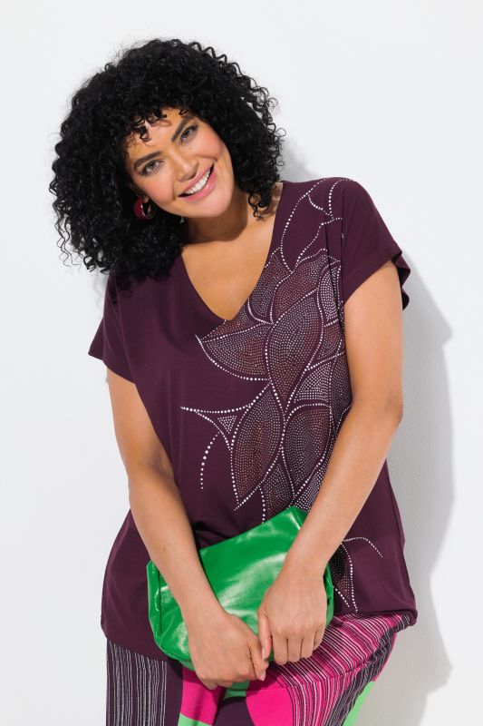T-shirt oversize. Col en V et manches courtes. Imprimé chatoyant