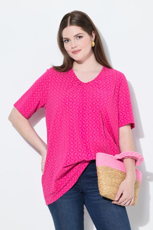 T-shirt s'inspirant des tenues traditionnelles bavaroises, encolure en V et manches courtes, coupe évasée