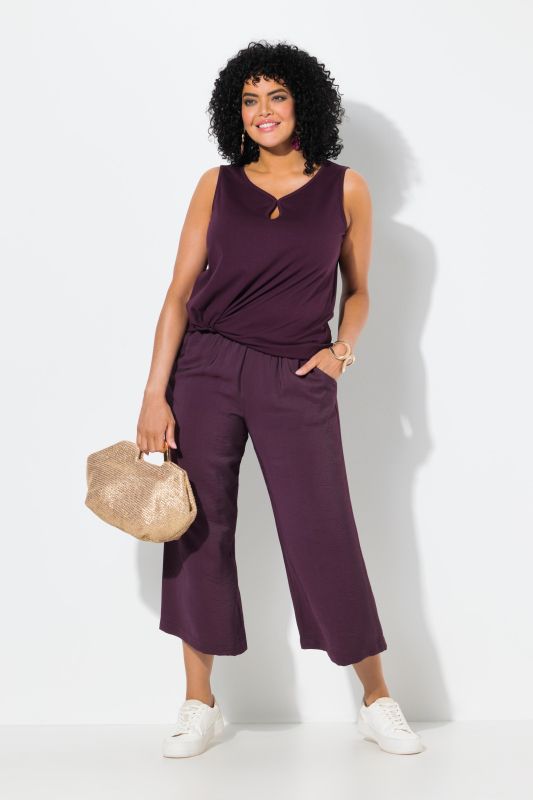 Jupe-culotte à jambe large et taille élastique. Tissu à texture irrégulière