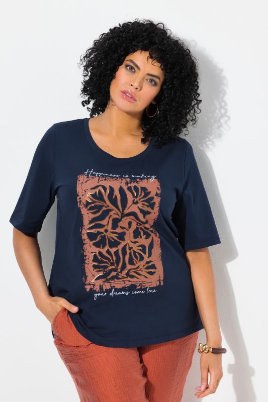 T-shirt à col rond et manches courtes. Imprimé fleurs à effet métallisé