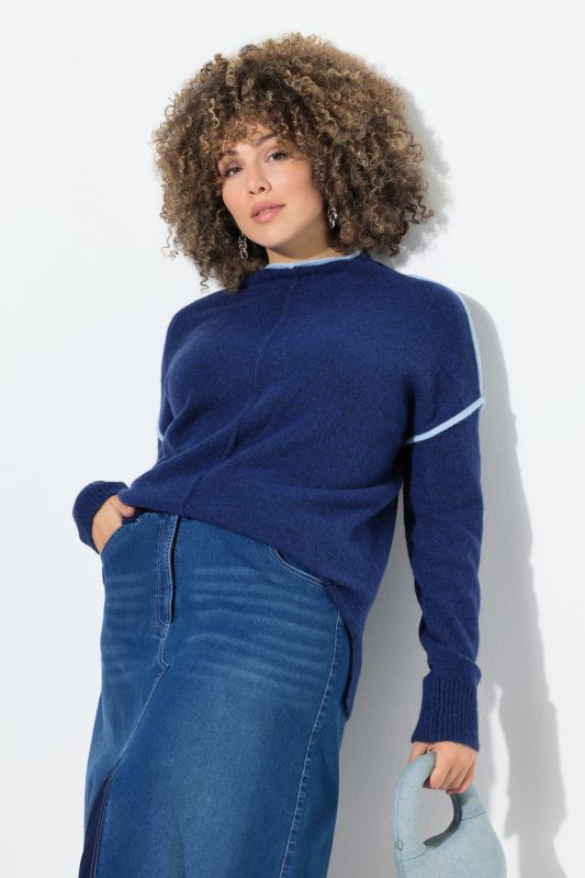 Pull oversize, bordures contrastantes, col montant et manches longues