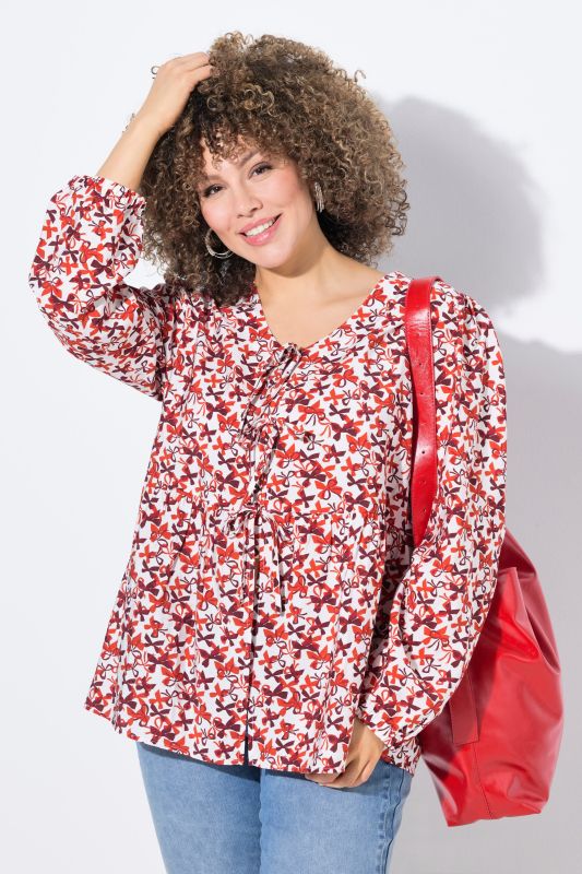 Blouse coupe évasée, imprimé petits nœuds, décolleté en V et manches longues