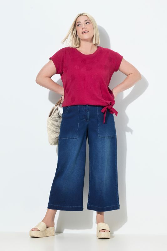 Jupe-culotte en jean Rose. Jambe large longueur mollet. Taille confortable