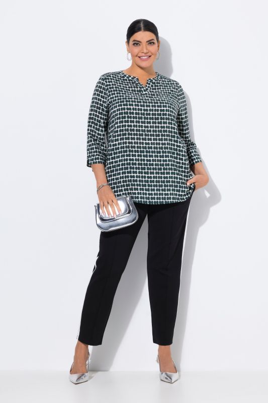 Pantalon point de Rome, jambe carotte et taille élastique, galon le long de la jambe