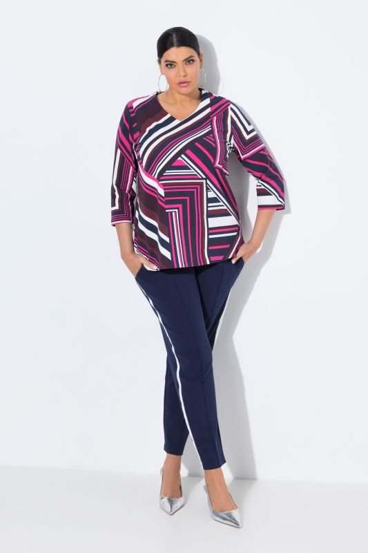 Pantalon point de Rome, jambe carotte et taille élastique, galon le long de la jambe