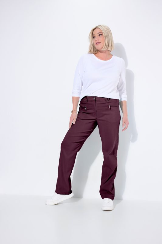 Pantalon Mony en tissu stretch thermique, jambe légèrement carotte, poches zippées