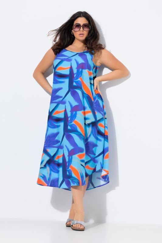 Robe midi sans manches. Col rond et imprimé à fleurs. Coupe évasée