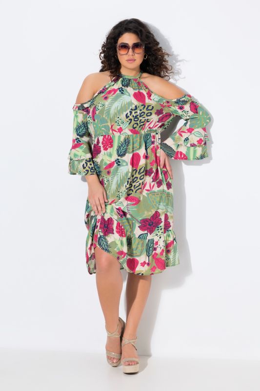 Robe à col rond et manches 3/4. Épaules nues et coupe évasée