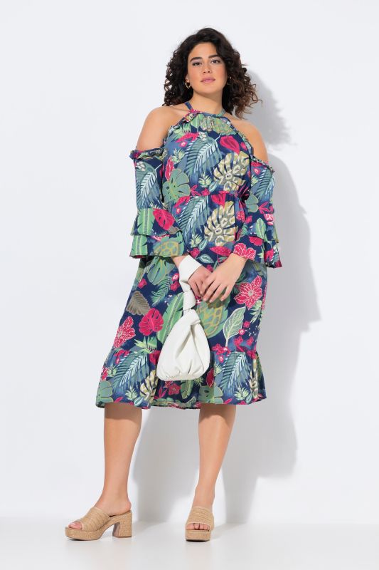 Robe à col rond et manches 3/4. Épaules nues et coupe évasée