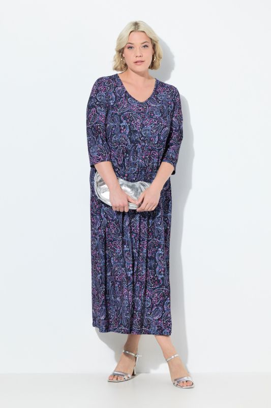 Robe en jersey, coupe évasée. Col en V et manches 3/4