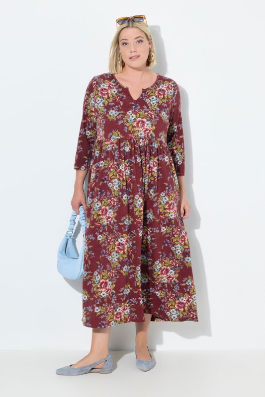 Robe maxi en jersey motif floral, col tunisien et manches 3/4, coupe évasée