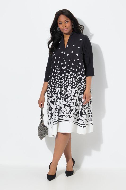 Robe midi en lyocell, coupe évasée. Col calice et manches 3/4
