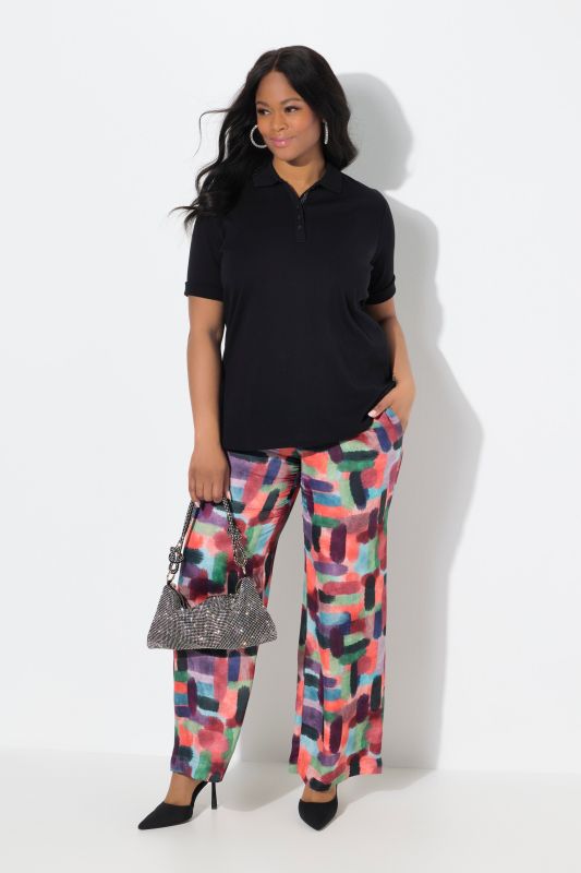 Pantalon en satin imprimé. Taille élastique et jambe large