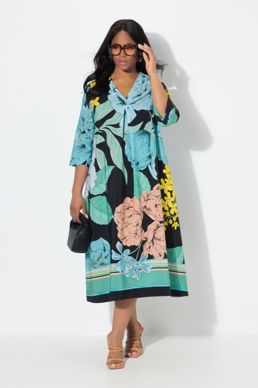 Robe midi en lyocell. Col en V et manches 3/4. Imprimé grandes fleurs. Coupe évasée