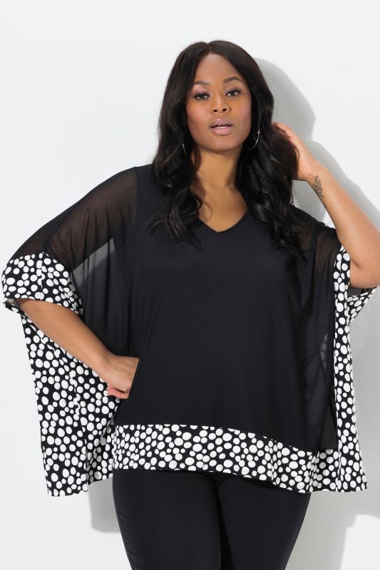 Blouse en mousseline, pois floqués. Col en V et manches 3/4