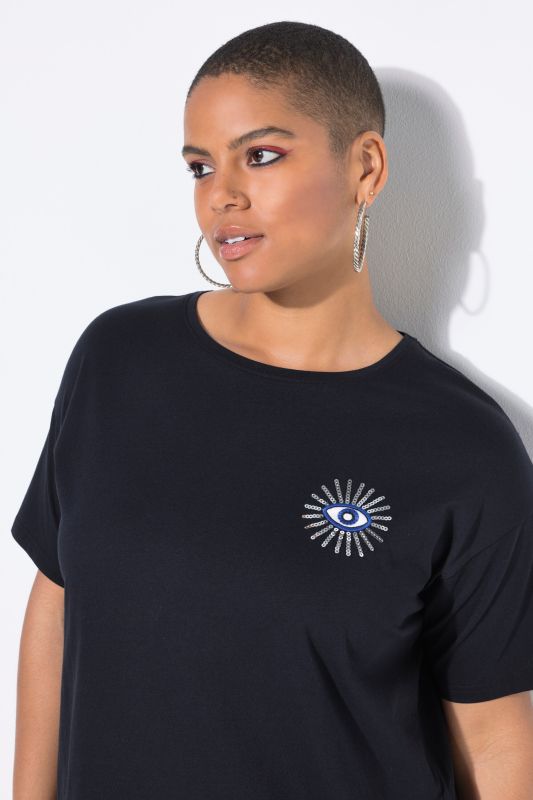 T-shirt oversize. Manches courtes. Motif œil scintillant