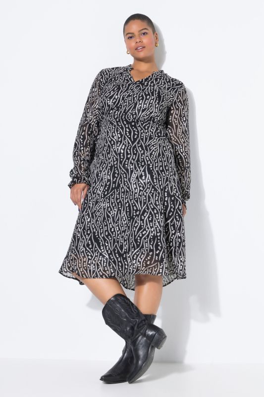 Robe midi, coupe évasée. Manches longues. Imprimé all-over