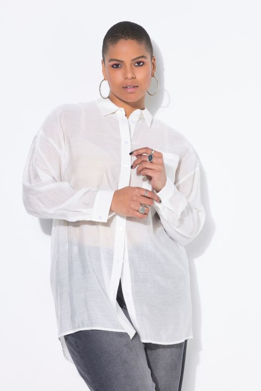 Chemisier oversize. Franges et sequins aux épaules