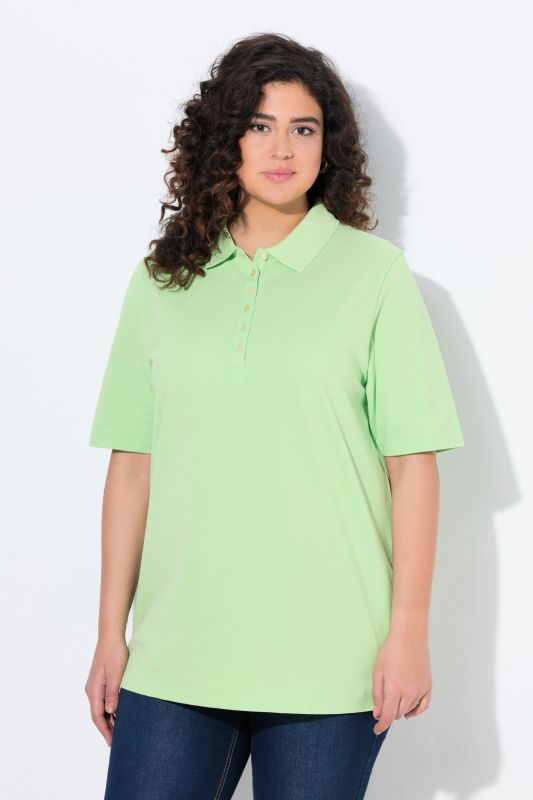 Polo en maille piquée. Patte de boutonnage en velours. Manches courtes