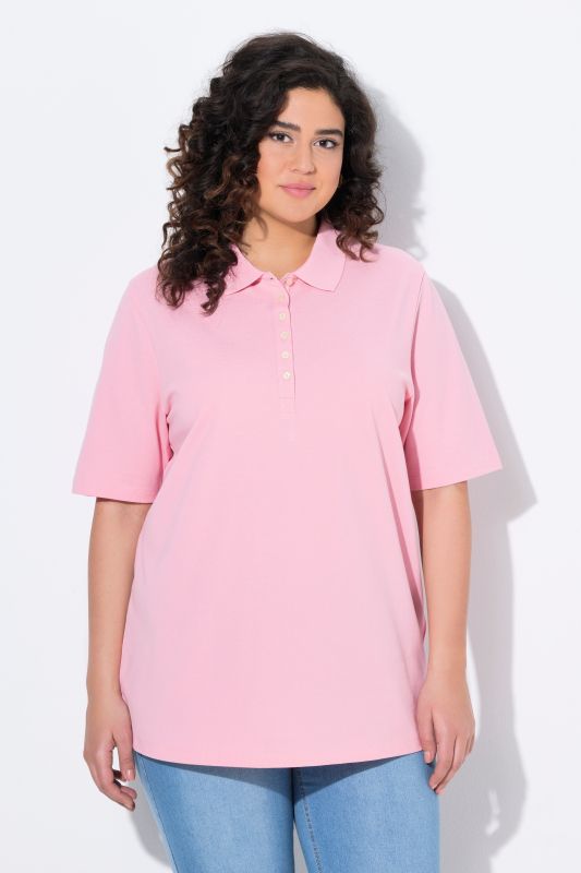 Polo en maille piquée. Patte de boutonnage en velours. Manches courtes