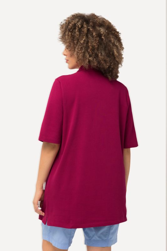 Polo en maille piquée. Patte de boutonnage en velours. Manches courtes