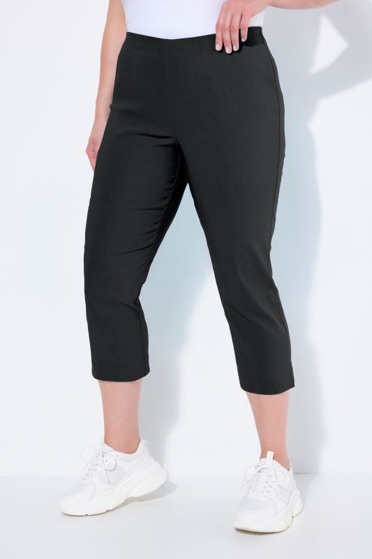 Pantalon en bengaline stretch. Longueur au mollet et taille élastique