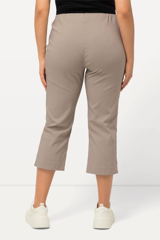 Pantalon en bengaline stretch. Longueur au mollet et taille élastique