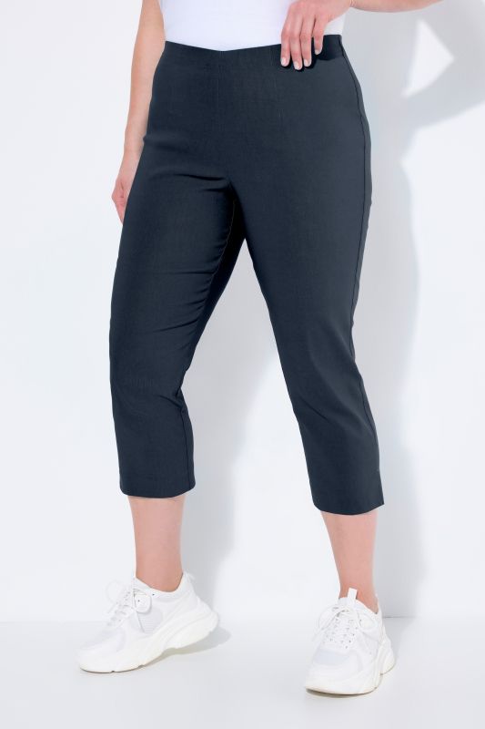 Pantalon en bengaline stretch. Longueur au mollet et taille élastique
