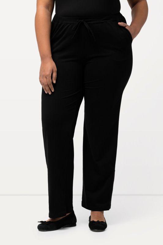 Pantalon en jersey avec jambes droites et poches, jusqu'à la taille 68/70
