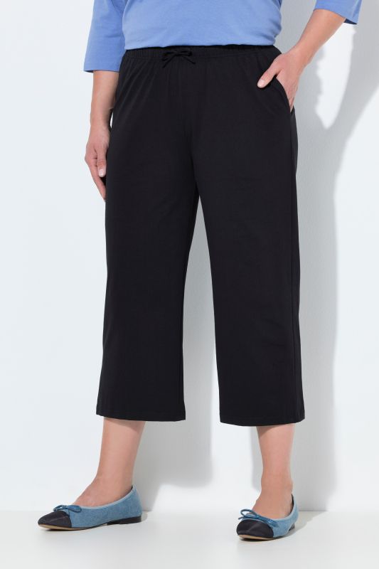 Pantalon 3/4 en jersey à jambe droite, disponible jusqu’au 68/70