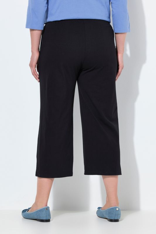 Pantalon 3/4 en jersey à jambe droite, disponible jusqu’au 68/70