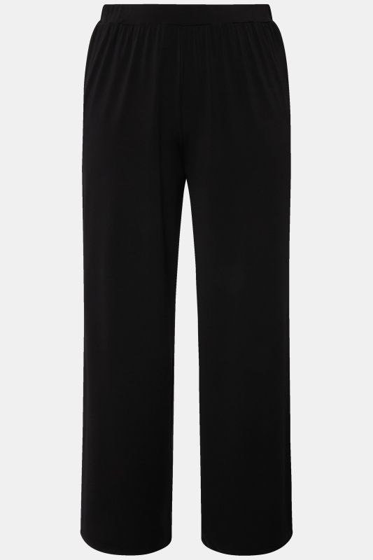 Pantalon en jersey à jambe large et taille élastique. Disponible jusqu’au 68/70.