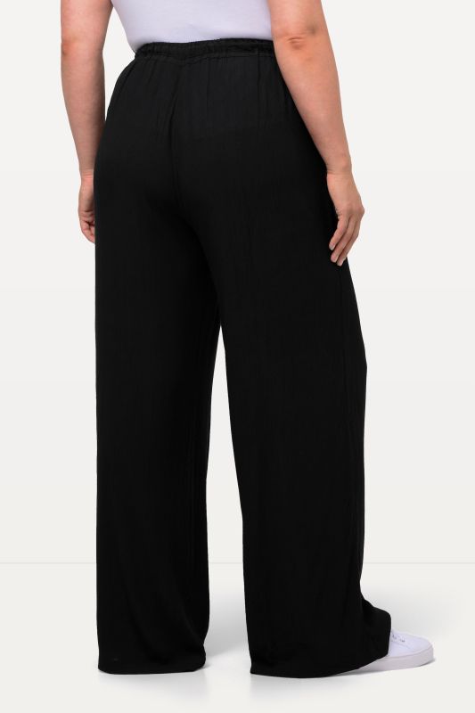 Pantalon Rose en viscose. Jambe large, taille élastique et cordon de serrage