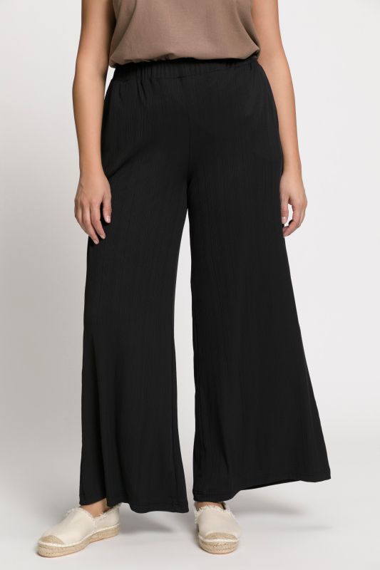 Pantalon Mary, coupe Marlene, jersey bord-côte, jambe large et taille élastique