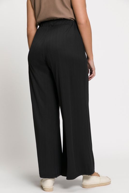 Pantalon Mary, coupe Marlene, jersey bord-côte, jambe large et taille élastique