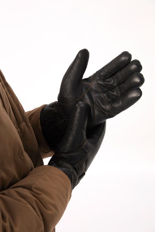 Gants en cuir  véritable. Doublure chaude et patte de réglage.