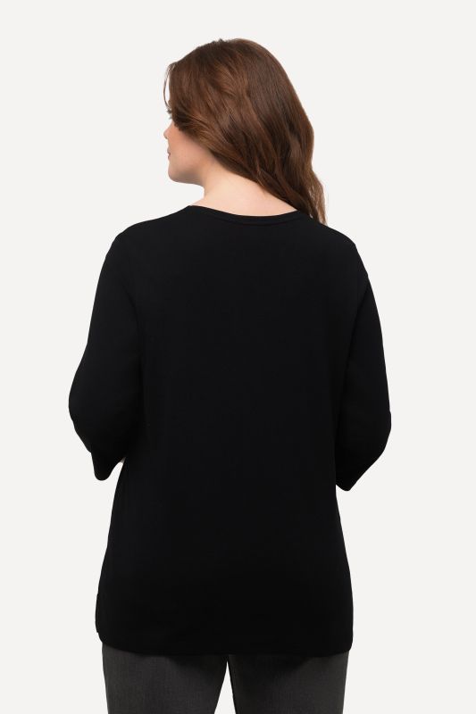 T-shirt, jersey bord-côte. Col en V et manches 3/4. Coton bio