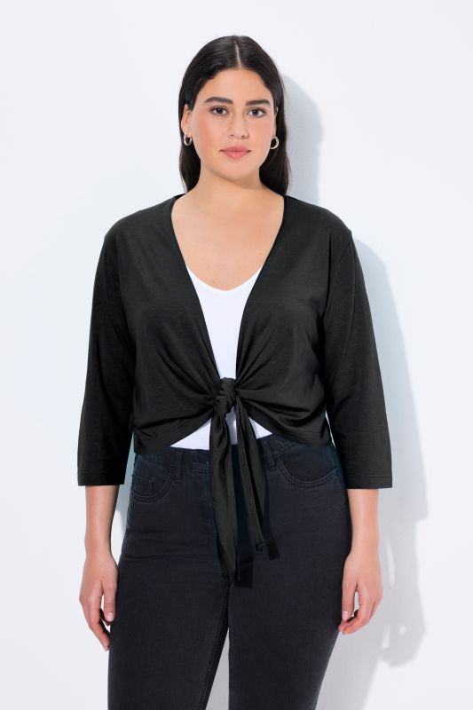 Boléro en jersey noué à la taille. Veste courte à manches 3/4