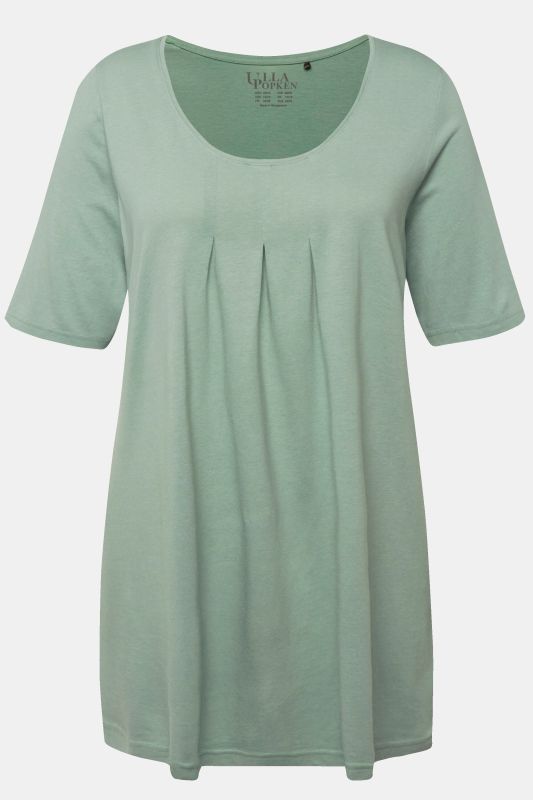 T-shirt en modal. Plis fantaisie, col rond et manches courtes. Coupe évasée